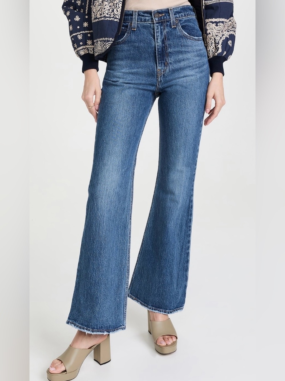 Levi’s Premium Women’s 70s High Flare Distressed Jeans. Size 25x32.